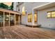 View of the exterior of a home with a backyard deck and screened-in porch at 448 Jardinere Walk, Mount Pleasant, SC 29464