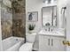 Updated bathroom with tiled shower, modern vanity, and stylish fixtures at 448 Jardinere Walk, Mount Pleasant, SC 29464