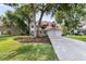 Traditional two-story home with two-car garage and well-maintained landscaping at 448 Jardinere Walk, Mount Pleasant, SC 29464
