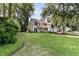 Charming two-story home with a manicured lawn and inviting front porch at 448 Jardinere Walk, Mount Pleasant, SC 29464