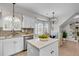Bright and modern kitchen with an island, stainless steel appliances, and breakfast area at 448 Jardinere Walk, Mount Pleasant, SC 29464
