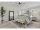 Serene main bedroom with plush carpeting, vaulted ceiling, stylish decor, and natural light at 448 Jardinere Walk, Mount Pleasant, SC 29464