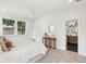 Light-filled bedroom with natural light, calming decor, and an en-suite bathroom for added convenience at 4620 O'Hear Ave, North Charleston, SC 29405
