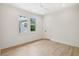 Well-lit bedroom with light hardwood floors, crown molding, and large windows offering a serene view at 4620 O'Hear Ave, North Charleston, SC 29405
