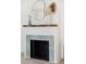Close up view of a modern fireplace with decorative details and a wooden mantel at 4620 O'Hear Ave, North Charleston, SC 29405