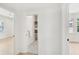 Hallway view showcasing a linen closet with decorative tile flooring and an open doorway at 4620 O'Hear Ave, North Charleston, SC 29405
