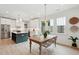 Bright kitchen and dining area, featuring modern appliances and sleek countertops at 4620 O'Hear Ave, North Charleston, SC 29405