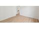 Bright living room with hardwood floors and an open doorway, creating an airy and inviting space at 4620 O'Hear Ave, North Charleston, SC 29405