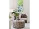 Comfortable chair in a bright living room with a modern mosaic center table and plant at 4620 O'Hear Ave, North Charleston, SC 29405