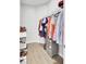 Spacious walk-in closet with rod and shelf storage for clothes and shoes at 469 Hainsworth Dr, Charleston, SC 29414