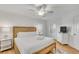 Bright bedroom with a ceiling fan, king bed, and white dresser at 509 Summerhouse, Isle of Palms, SC 29451
