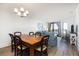 Comfortable dining room next to living space and a balcony overlooking the beach at 509 Summerhouse, Isle of Palms, SC 29451