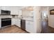 Well-appointed kitchen features stainless steel appliances, sleek finishes, and modern lighting at 509 Summerhouse, Isle of Palms, SC 29451
