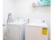 Laundry room with standard sized washer and dryer at 509 Summerhouse, Isle of Palms, SC 29451