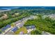 Scenic aerial shot of townhomes nestled amongst trees, showcasing the community's layout and proximity to natural surroundings at 5135 Park Creek Ave, North Charleston, SC 29418