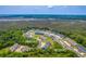 Overhead shot of the residential community near wooded buffer, with Ashley River visible in the distance at 5135 Park Creek Ave, North Charleston, SC 29418