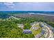 Expansive aerial view displaying the neighborhood's proximity to scenic marshland and waterways, enhancing its natural appeal at 5135 Park Creek Ave, North Charleston, SC 29418
