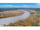 Aerial view of the Intracoastal Waterway with docks and marshland at 5135 Park Creek Ave, North Charleston, SC 29418