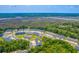 Aerial view of townhome community nestled in a scenic wooded area near a river at 5135 Park Creek Ave, North Charleston, SC 29418