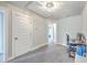 View of basement area from a wider angle, showing more floor space, and an open doorway at 5135 Park Creek Ave, North Charleston, SC 29418