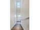 Well-lit staircase with modern railings and natural light from the windows at 5135 Park Creek Ave, North Charleston, SC 29418