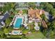 Aerial view featuring community amenities including the tennis courts and pools at 6002 Green Dolphin Way, Kiawah Island, SC 29455