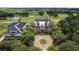 Aerial view of an estate home overlooking the golf course at 6002 Green Dolphin Way, Kiawah Island, SC 29455