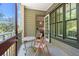 Inviting balcony with seating and a view through the open doorway at 6002 Green Dolphin Way, Kiawah Island, SC 29455
