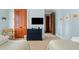 Comfortable bedroom offers a TV, ceiling fan, and access to a full bathroom at 6002 Green Dolphin Way, Kiawah Island, SC 29455