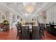 Elegant dining room featuring a coffered ceiling and open concept floor plan at 6002 Green Dolphin Way, Kiawah Island, SC 29455