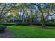 Stately home with lush greenery and mature trees at 6002 Green Dolphin Way, Kiawah Island, SC 29455