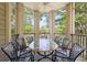Relaxing porch with ample seating and beautiful natural views at 6002 Green Dolphin Way, Kiawah Island, SC 29455