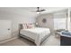 Bright bedroom with neutral tones, vaulted ceiling, and ample natural light at 627 Macintyre Cir, Summerville, SC 29486