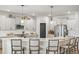 Stylish kitchen with gray cabinets, stainless appliances, subway tile backsplash, and a large island at 627 Macintyre Cir, Summerville, SC 29486
