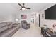 Relaxing living room featuring comfortable seating, ceiling fan, and modern decor at 627 Macintyre Cir, Summerville, SC 29486