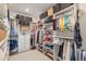 Spacious walk-in closet with custom shelving, hanging rods, and storage boxes at 627 Macintyre Cir, Summerville, SC 29486