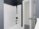 Modern bathroom with black fixtures and white tub at 661 Black Pine Rd, Moncks Corner, SC 29461