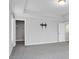 Neutral bedroom featuring gray carpet, closet with wire shelving, and standard doorway at 661 Black Pine Rd, Moncks Corner, SC 29461
