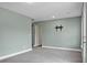 Spacious bedroom with neutral walls, soft carpet and mounted TV bracket at 661 Black Pine Rd, Moncks Corner, SC 29461