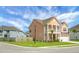 Inviting two-story home showcasing a charming front porch, a well-manicured lawn, and a two-car garage at 661 Black Pine Rd, Moncks Corner, SC 29461