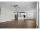 Open concept living room and kitchen with hardwood floors and recessed lighting at 661 Black Pine Rd, Moncks Corner, SC 29461