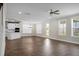 Living room featuring hardwood floors and access to the backyard at 661 Black Pine Rd, Moncks Corner, SC 29461
