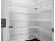 Walk-in pantry features white wire shelving for ample storage at 661 Black Pine Rd, Moncks Corner, SC 29461