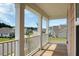 Charming porch with classic white railings overlooking a beautiful neighborhood street at 661 Black Pine Rd, Moncks Corner, SC 29461