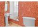Charming half bath with beautiful wallpaper, pedestal sink, and natural light at 8 & 8 1/2 Elliott St # 8 & 8 1/2, Charleston, SC 29401
