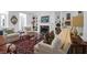 Cozy living room features fireplace, hardwood floors, and comfortable seating perfect for relaxing at 8 & 8 1/2 Elliott St # 8 & 8 1/2, Charleston, SC 29401