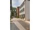 Picturesque street view showcasing classic architecture, lush trees, and inviting curb appeal at 8 & 8 1/2 Elliott St # 8 & 8 1/2, Charleston, SC 29401