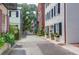 Charming neighborhood street view showcases beautiful homes with classic architecture and lush greenery at 8 & 8 1/2 Elliott St # 8 & 8 1/2, Charleston, SC 29401