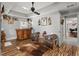 Stylish bar area with hardwood floors, custom cabinetry, and comfortable seating at 8605 Refuge Point Cir, North Charleston, SC 29420