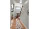 Grand foyer with staircase, chandelier, arched window, and elegant front door at 8605 Refuge Point Cir, North Charleston, SC 29420